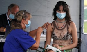 Sofia Parkinson, 16, getting a vaccine jab at a walk-in Covid-19 vaccination clinic at the Reading Festival.