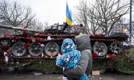 Roses on a destroyed Russian tank type T-72 next to the Russian embassy in Berlin, Germany.