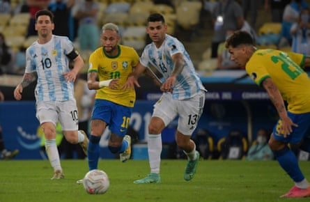Neymar and Cristian Romero vie for the ball in the Copa América final.