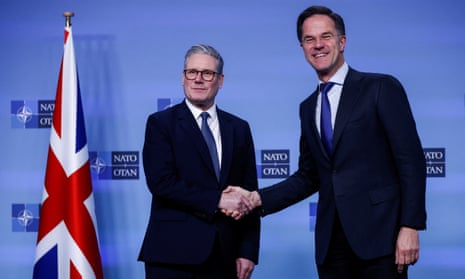 British prime minister Keir Starmer shakes hands with Nato Secretary General Mark Rutte at the Alliance’s headquarters in Brussels.