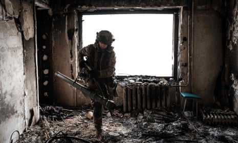 A Ukrainian serviceman in a position in Bakhmut.