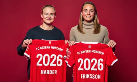 Pernille Harder and Magda Eriksson hold Bayern Munich shirts after signing for the club