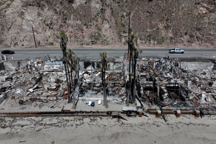 remnants of burned homes off a coastline highway