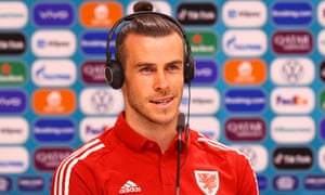 Bale speaks to the press.