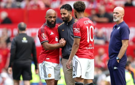 Bryan Mbeumo and Matheus Cunha of Manchester United talk with Ruben Amorim, during the pre-season friendly between Manchester United and Fiorentina.
