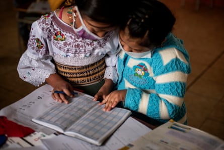 Two Karanki indigenous girls study together