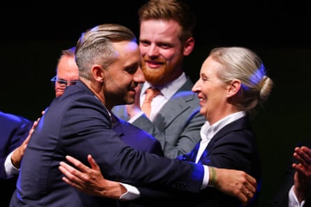 AfD candidate Ulrich Siegmund embraces co-leader Alice Weidel after the party won 44% of the vote in the Saxony-Anhalt state elections, September 2026.