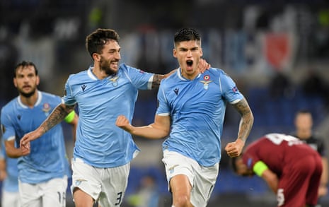 Lazio’s Joaquin Correa (right) celebrates after opening the scoring with Danilo Cataldi who seems to find it funny.