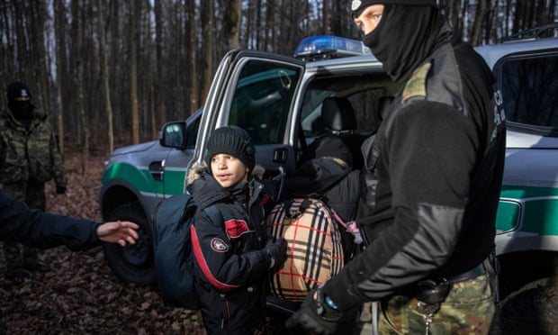 A family from Duhok, Iraq stuck near the border after crossing from Belarus.