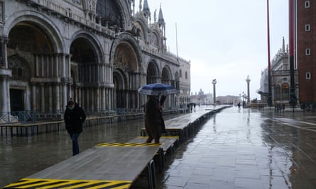 Raised walkways in St Mark’s Square, Venice, during the high tide on 15 October.