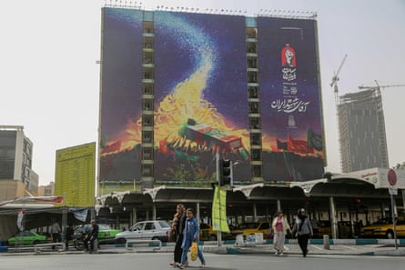 A banner with a picture of Ali Khamenei’s coffin