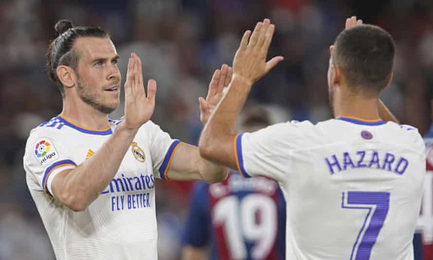 Real Madrid’s Gareth Bale, left, celebrates with Eden Hazard after scoring his side’s opening goal.