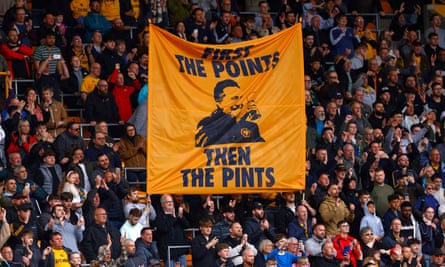 Wolves fans unfurl a banner during the win over Tottenham