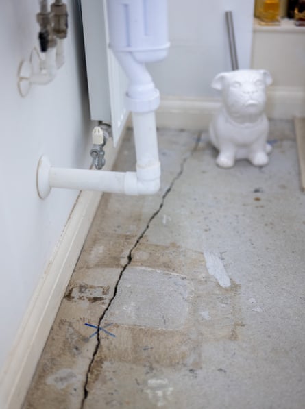 A crack in the floor at the home of Dayle Dixon and Mark Lee