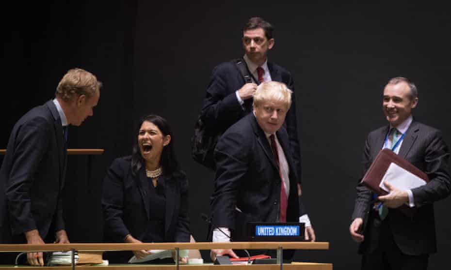 Cabinet ministers Priti Patel and Boris Johnson wait to hear Theresa May address the United Nations in September