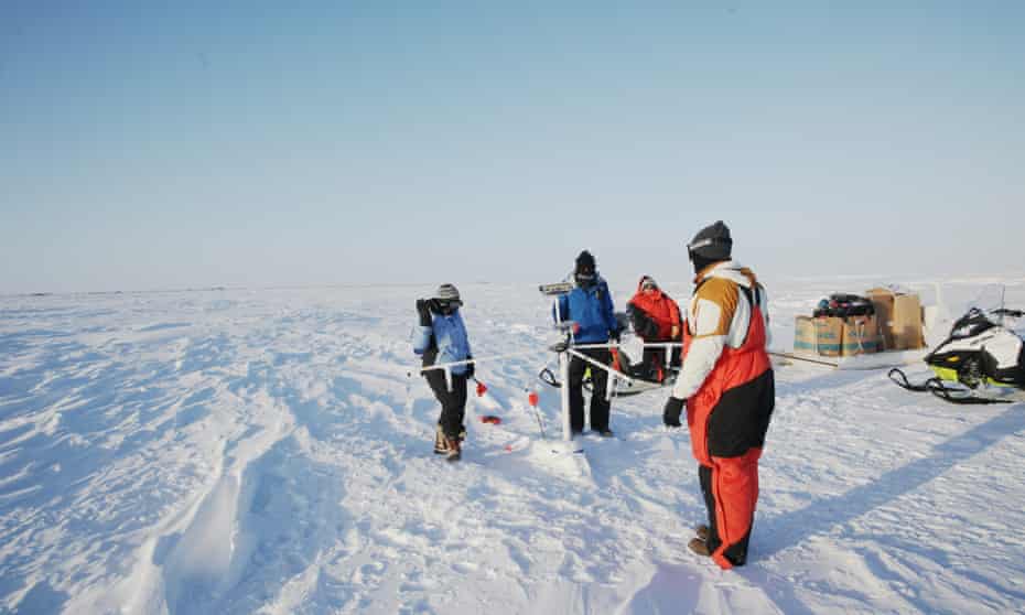Ice911 researchers at work at their test site near Utqiaġvik, Alaska.