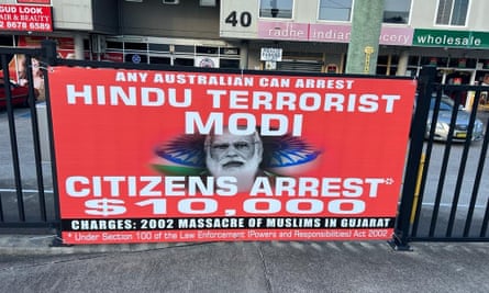 Banners critical of Indian prime minister Narendra Modi