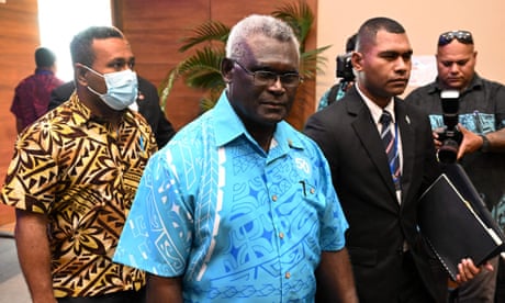 Prime minister of the Solomon Island Manasseh Sogavare (C) arrives for the opening remarks of Pacific Islands Forum (PIF) in Suva in July, 2022.