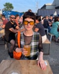 Anne Davies outdoors with a glass ion her hand