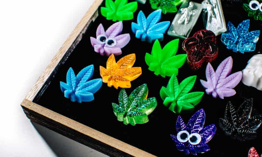 Badges of honour: assorted glass marijuana leaf-shaped decorative pieces on display in the church lounge.