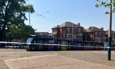 A tram remains cordoned off in Nottingham after the incident.