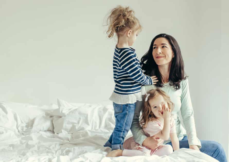 Emma Brockes with her twin daughters