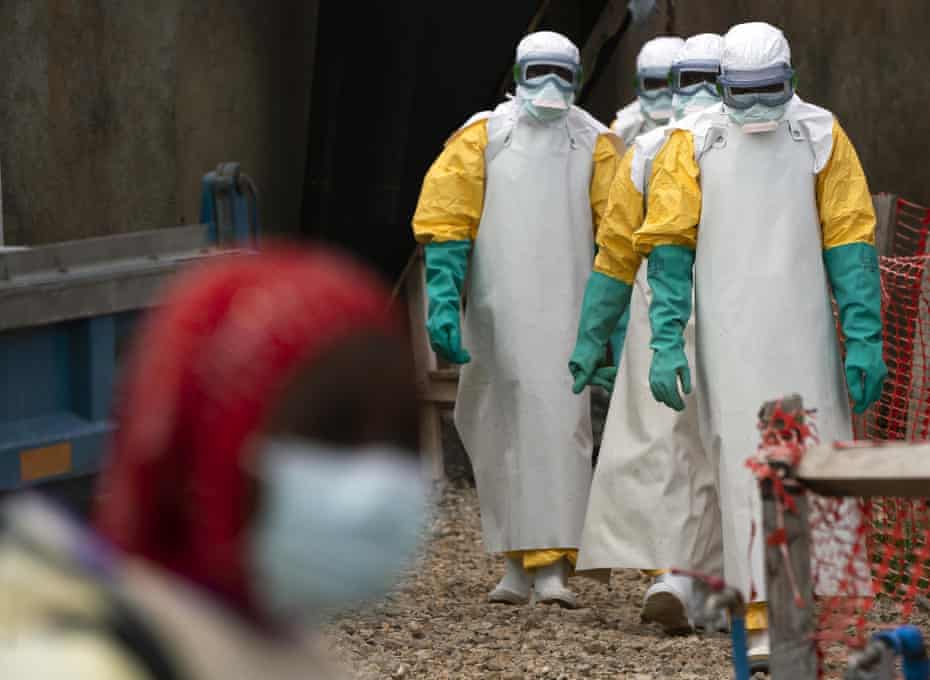 Health workers in protective clothing at an Ebola treatment centre in Beni, Democratic Republic of Congo, this week