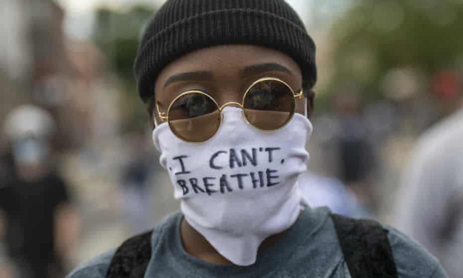 A protester marches in Philadelphia, Pennsylvania, on Sunday. 