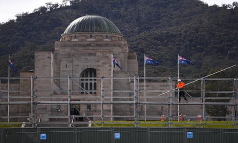 A worker sets up scaffolding as early redevelopment works are under way at the Australian War Memorial in Canberra
