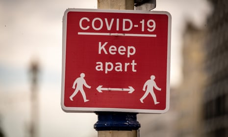 A ‘Covid-19 keep apart’ physical distancing sign is seen in Eastbourne