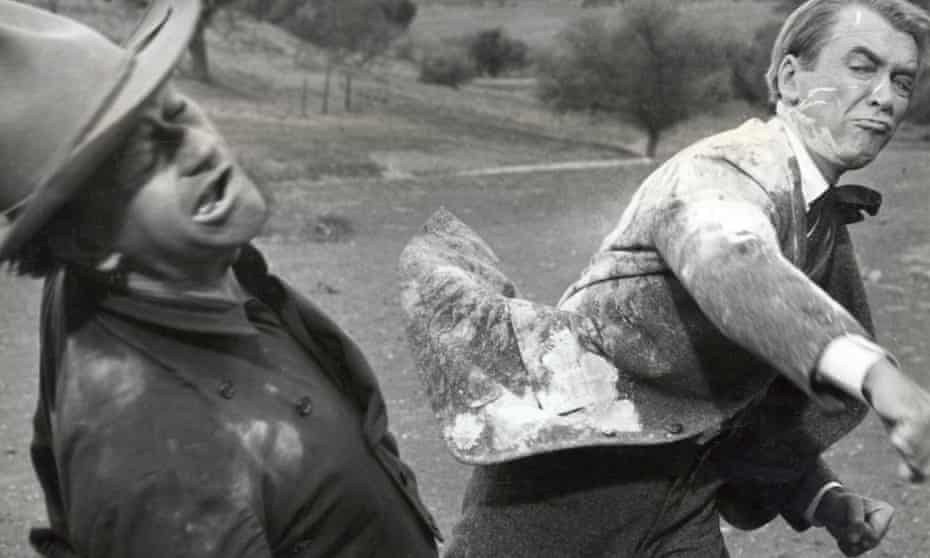 John Wayne and James Stewart in action on the set of The Man Who Shot Liberty Valance.