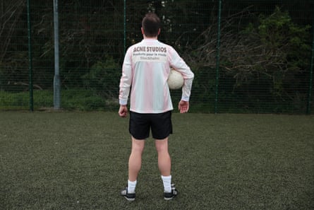 Rear view of player in football kit