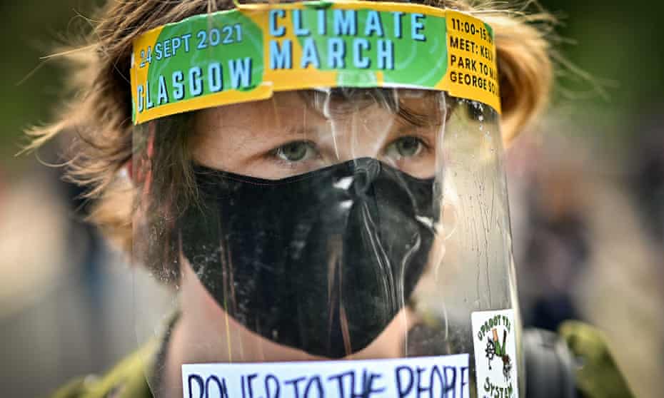 A boy at at climate protest in Glasgow