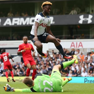 Liverpool’s goalkeeper, Simon Mignolet, blocks Harry Kane’s replacement, Joshua Onomah.