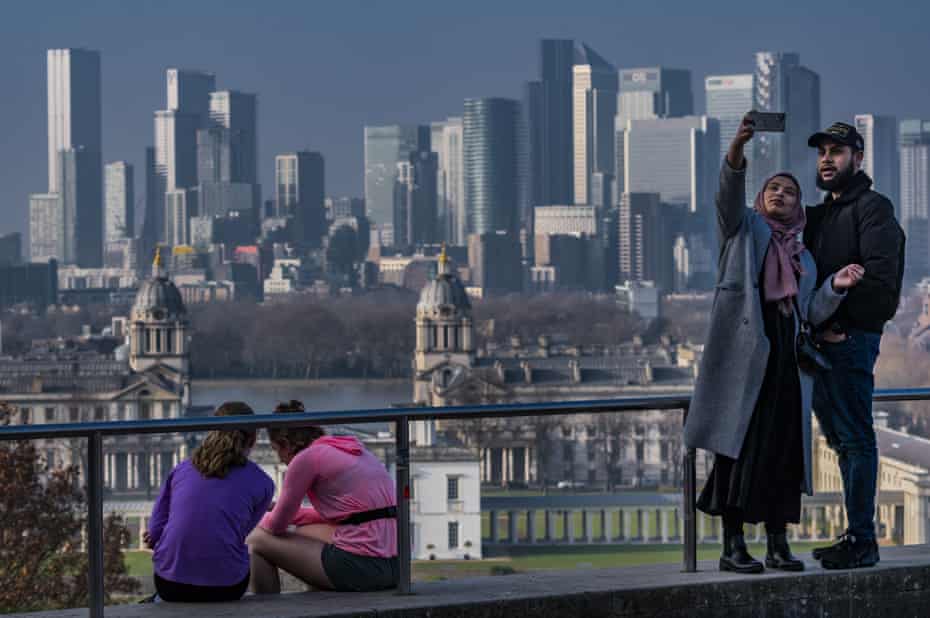 Greenwich Park, overlooking the high-rises of Canary Wharf in London in March 2021.