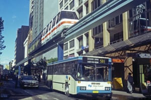 A 501 bus heads to the intersection of Pitt and Park streets in the city while, above it, the new TNT Harbourlink monorail is on a test run in May 1988. It was closed in 2013