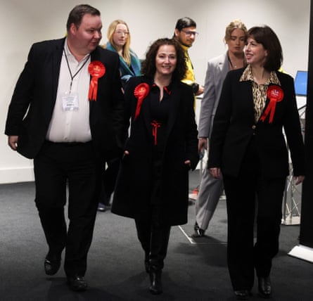 Angeliki Stogia walking with Lucy Powell and Andrew Western