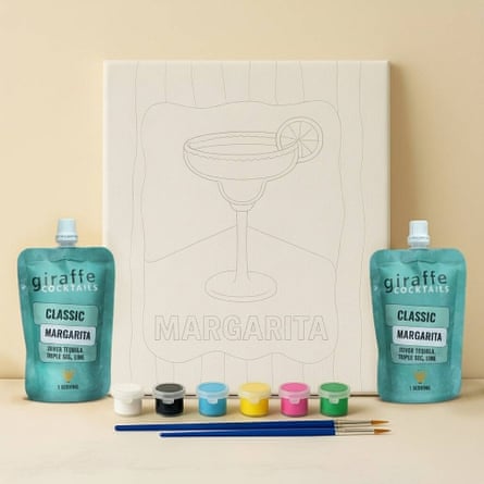 Paint And Sip Gift Bundle Margarita set. The ready to paint canvas is displayed with cocktail pouches, paint set and paint brushes.