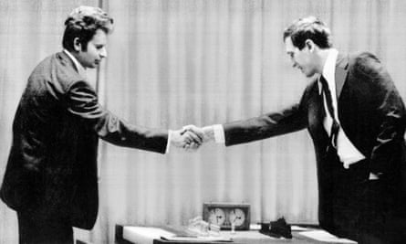 Russian Boris Spassky (left) shakes hands with American Bobby Fischer at the World Chess Championship in 1972