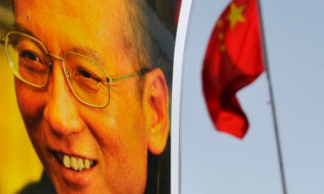 An image of Liu Xiabo next to a Chinese flag