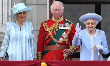 Queen Elizabeth II waving next to Prince Charles and Camilla, Duchess of Cornwall, from the Buckingham Palace balcony during Thursday’s celebrations.