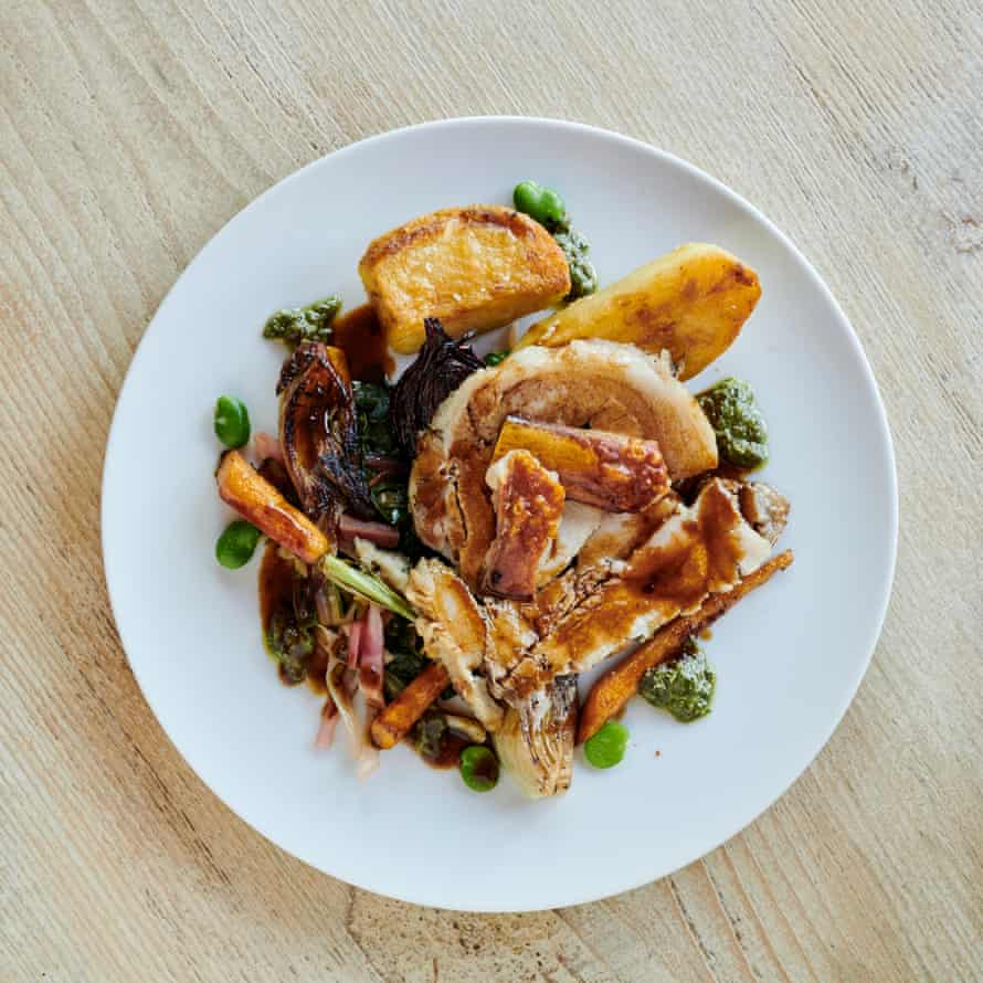 Roast porchetta with roast potatoes, fennel, butternut squash and herb green salad served at The Cove, Hastings.