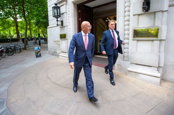Nadhim Zahawi (left) leaving the TV studio at Millbank in Westminster this morning after an interview.