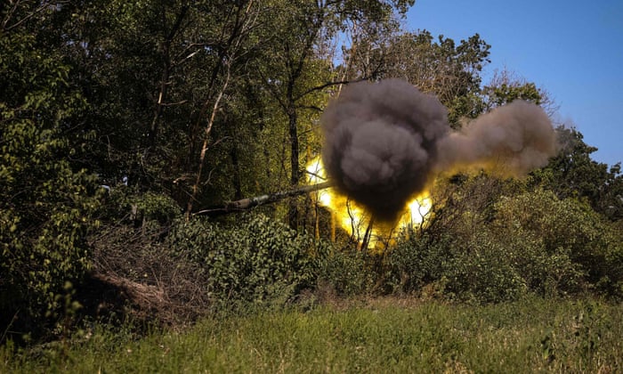 Ukrainian servicemen fire a Polish howitzer at a position on the front line in the Donetsk region.