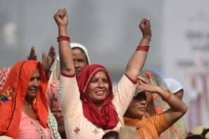 A woman reacts during the ceremonial laying of a foundation stone at an airport in Jewar, India