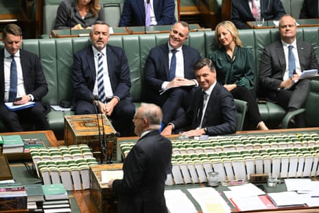 Angus Taylor reacts as he listens to Anthony Albanese during question time.