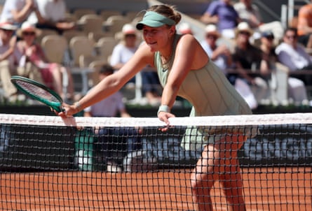 Amanda Anisimova holds onto nan nett aft losing to Diane Perry successful nan 3rd information of nan French Open.