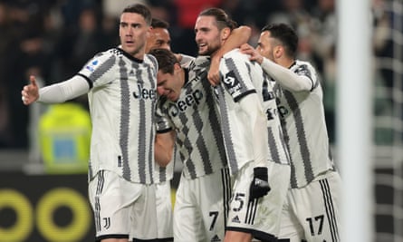 Adrien Rabiot of Juventus (second right) celebrates with teammates after scoring against Fiorentina.