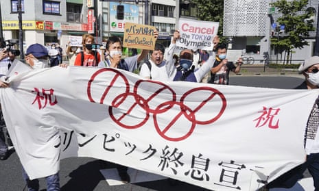 Protesters against the Olympic and Paralympic Games march in Tokyo on Saturday