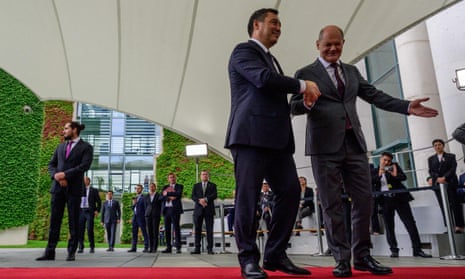 German chancellor Olaf Scholz shakes hands with Kyrgyz president Sadyr Japarov at the start of the meeting with Central Asian leaders in Berlin